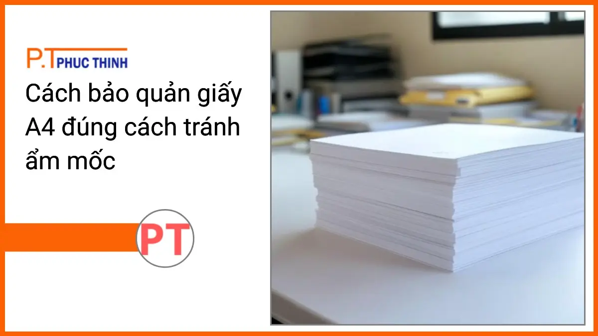 Chồng giấy A4 trắng sáng PT Phúc Thịnh trên bàn làm việc văn phòng gọn gàng, hướng dẫn cách bảo quản giấy A4 đúng cách tránh ẩm mốc.