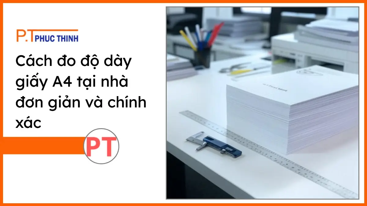 Chồng giấy A4 PT Phúc Thịnh trên bàn làm việc hiện đại, cùng dụng cụ đo độ dày giấy và văn phòng phẩm gọn gàng.
