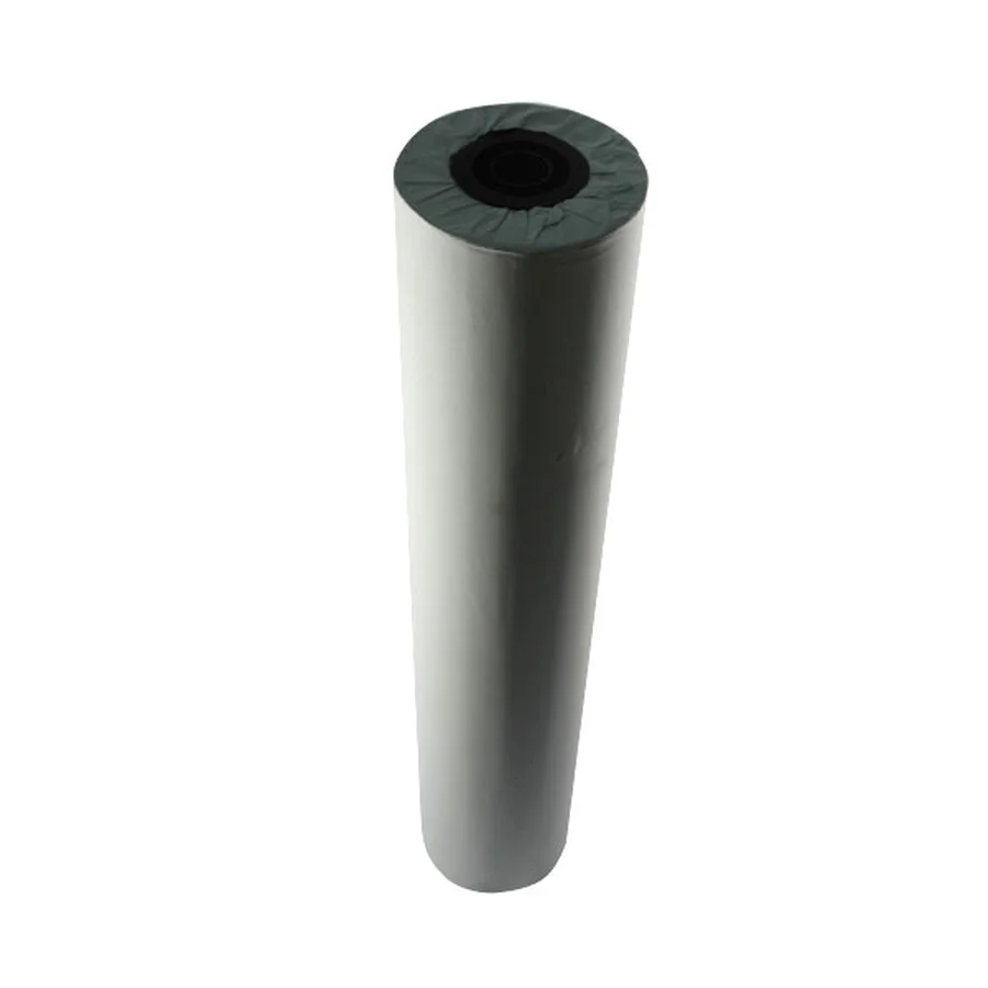 Cuộn giấy in A0 định lượng 100gsm lõi carton cứng đặt cạnh máy in khổ lớn văn phòng thiết kế